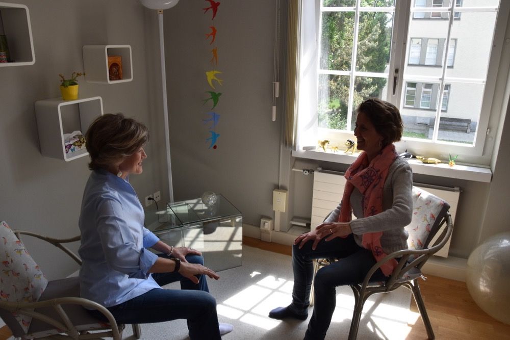 Cranio Sakral Therapie Gespräch Eltern von Kind